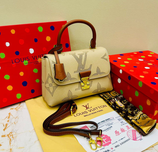 Louis Vuitton – Petite Lock Satchel